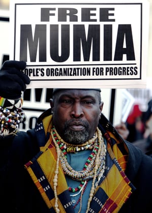 A supporter of inmate Mumia Abu-Jamal outside City Hall in Philadelphia, in 2006.